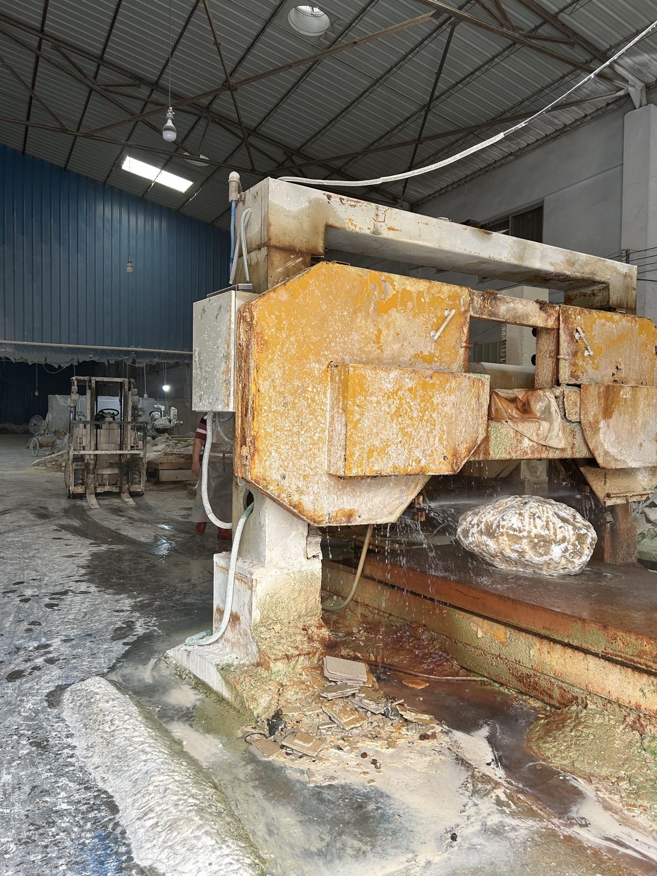 Stone processing at a selected production partner